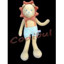 SUCRE D'ORGE Doudou lion jaune short bleu