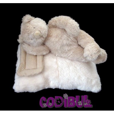 MOULIN ROTY Doudou musical ours allongé sur coussin linvosges