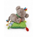 NICOTOY Doudou musical singe couché sur coussin vert